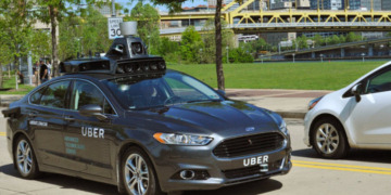 A Uber Self Driving Car manned with a driver for safety percautions