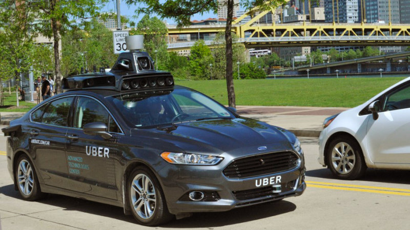 A Uber Self Driving Car manned with a driver for safety percautions