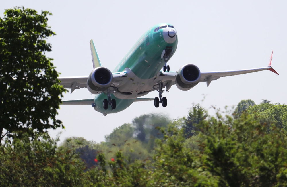 A Boeing 737 MAX 8 jetliner being built for Turkish Airlines takes off on a test flight, Wednesday, May 8, 2019, in Renton, Wash. Passenger flights using the plane remain grounded worldwide as investigations into two fatal crashes involving the airplane continue. (AP Photo/Ted S. Warren)