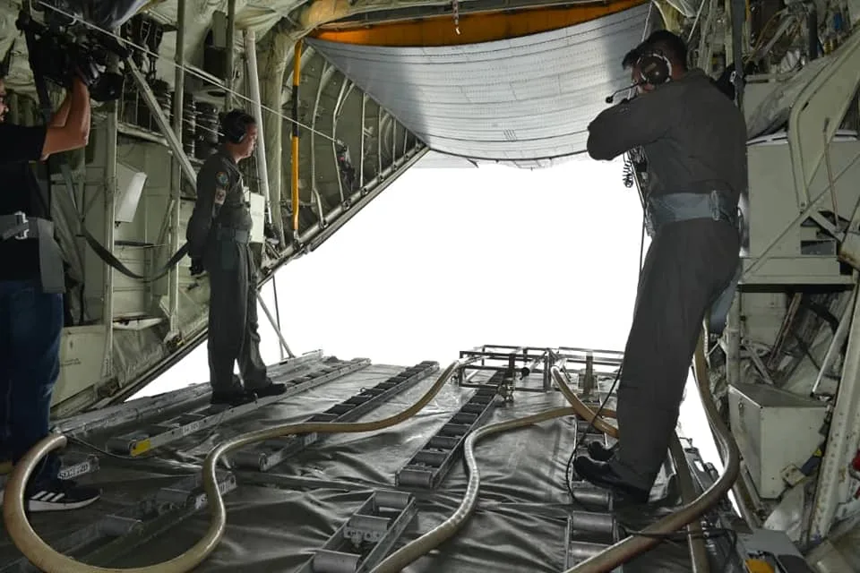 View from the RMAF's C-130 during the cloud seeding operation.