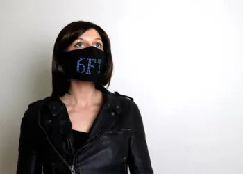 Fashion Designer Creates LED face mask charity