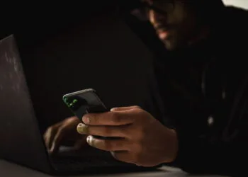 phone scam hacker stock photo