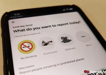 repotlah smoking cigarette report snitch