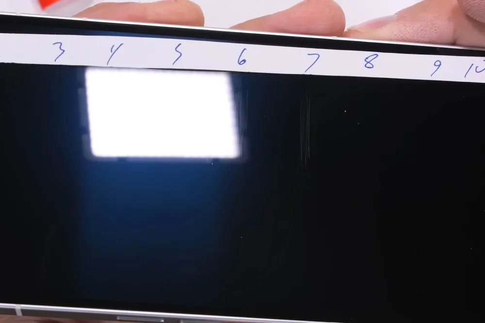 Nothing Phone (2) JerryRigEverything screen scratch
