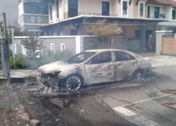 One of the many vehicles damaged during the explosion