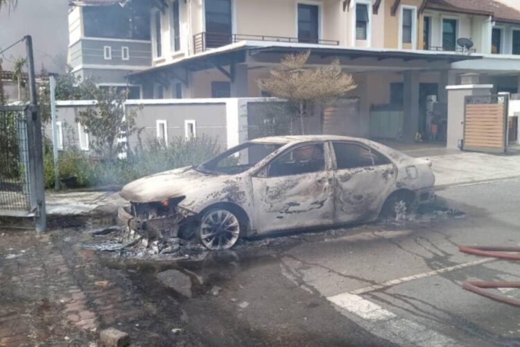One of the many vehicles damaged during the explosion