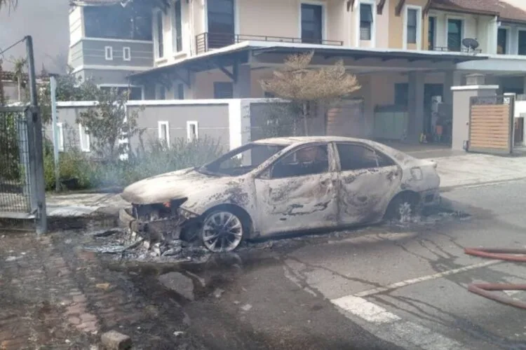 One of the many vehicles damaged during the explosion