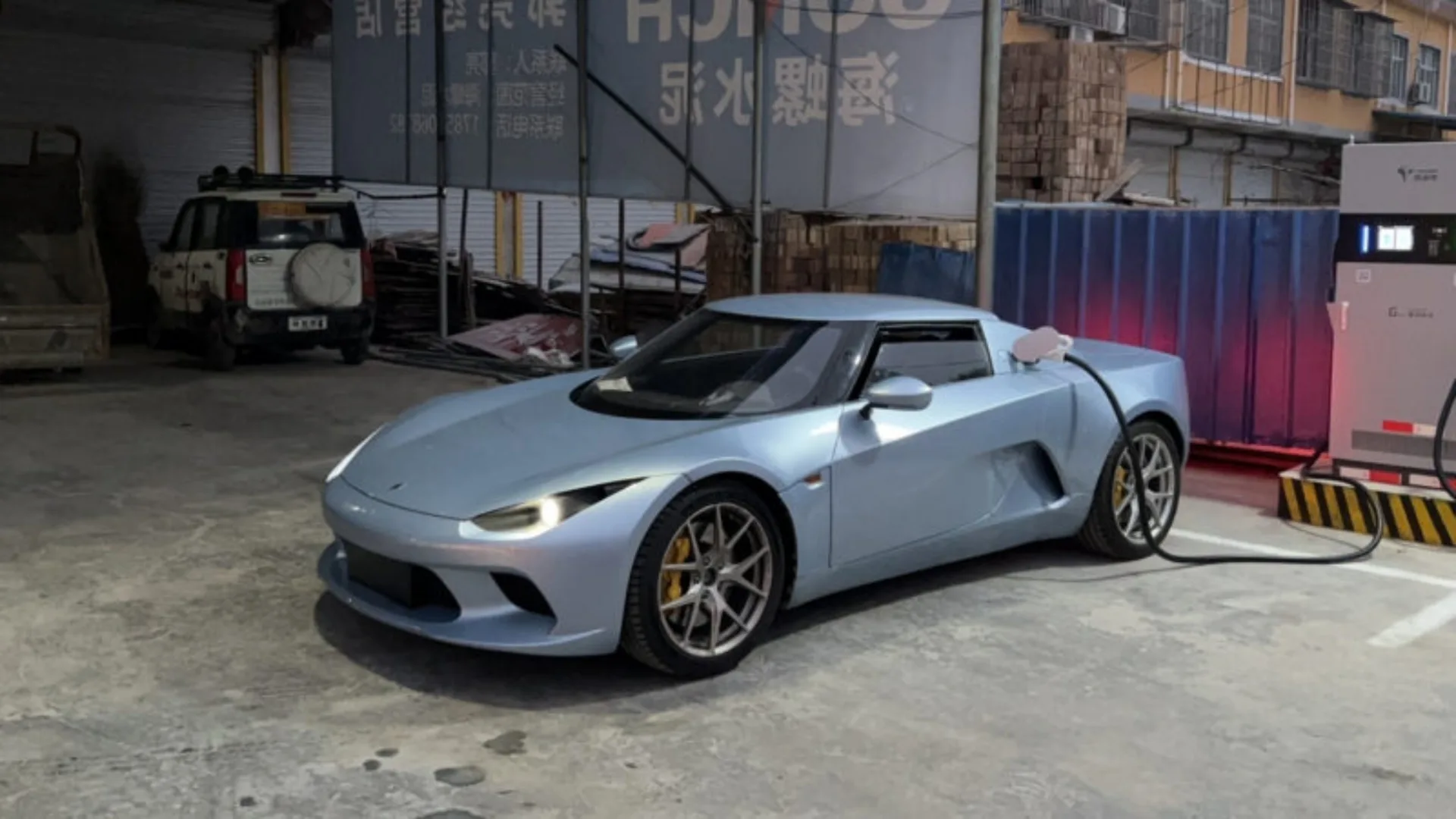 the electric roadster charging 