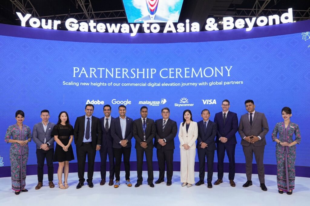 Malaysia Aviation Group tech partnership Google Adobe Visa Skyscanner