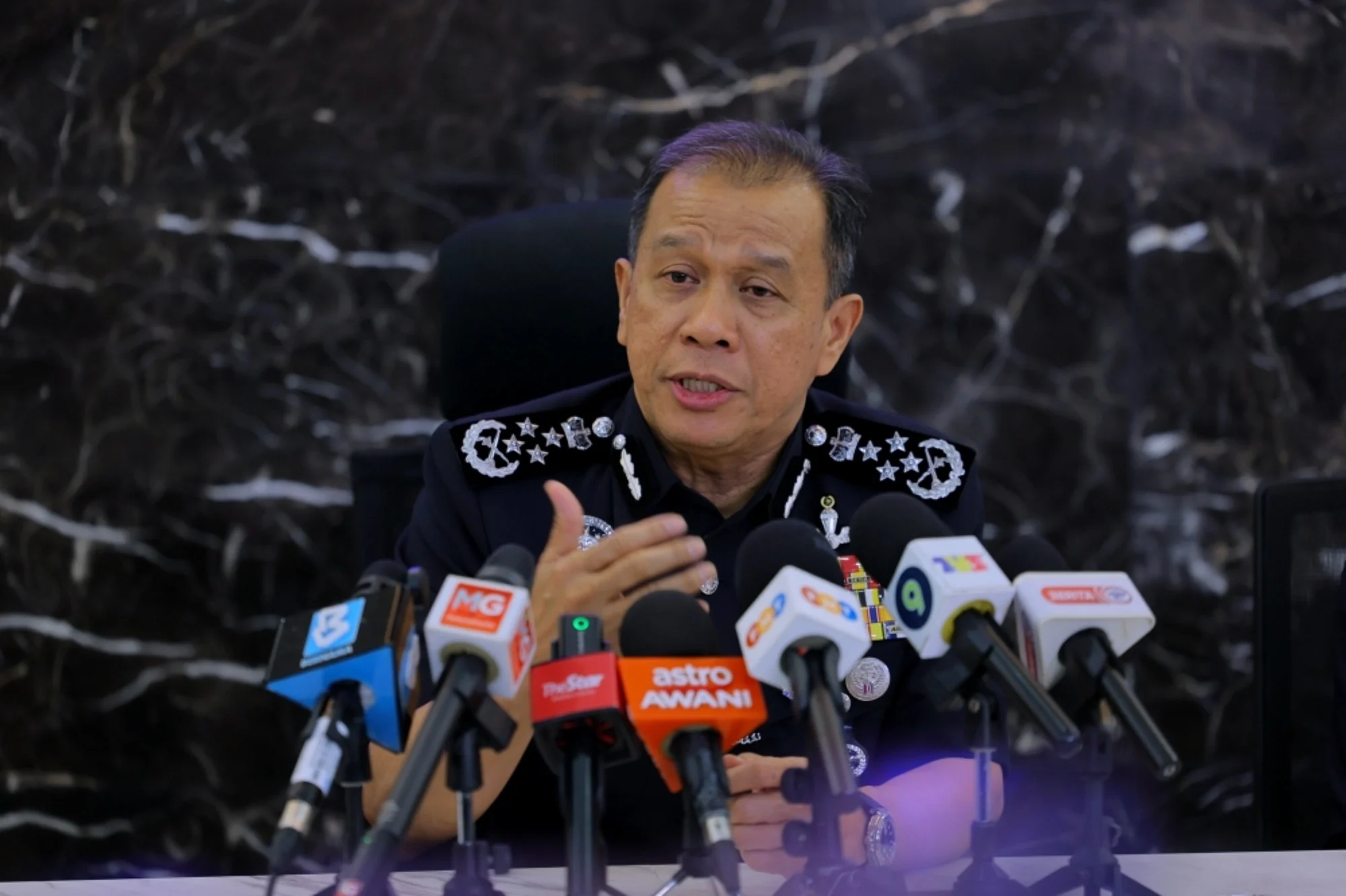Inspector-General of Police Tan Sri Mohd Khalid Ismail online scam cases