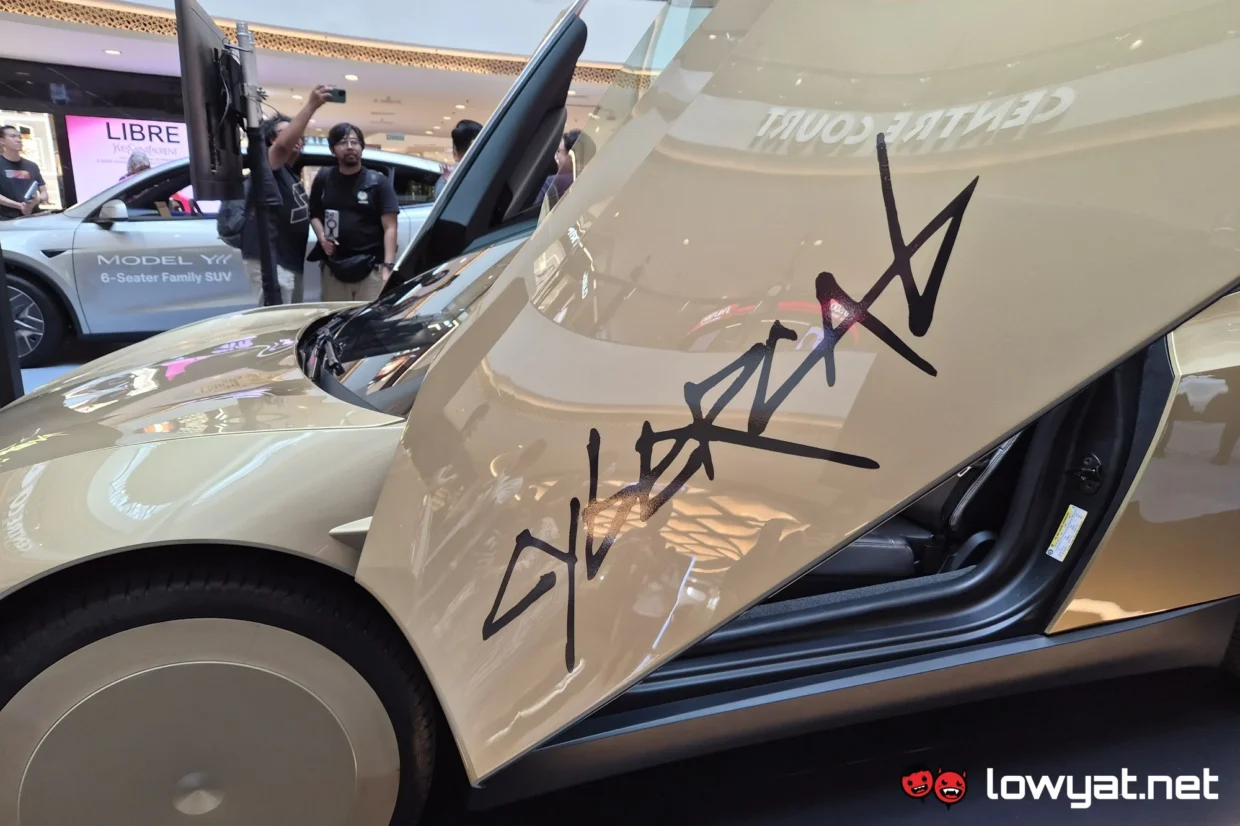 Tesla Cybercab Preview: The Future Is Temporarily Here 4 Tesla Cybercab branding on door