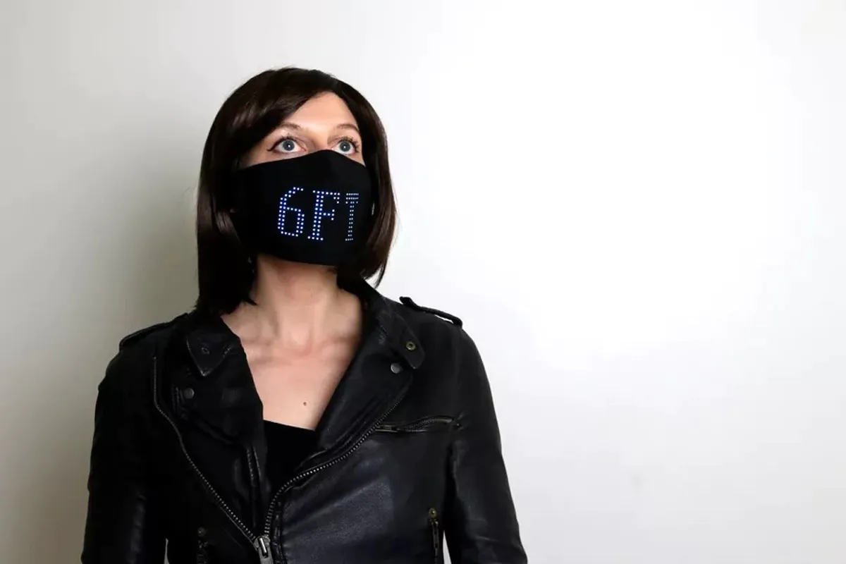 Fashion Designer Creates LED face mask charity